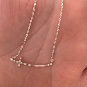 Sideways cross curved necklace
